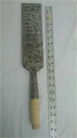 Large chisel with wooden handle