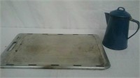 Nice heavy griddle with metal camping coffee pot