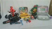 Group of kids toys includes toy laptops Teenage