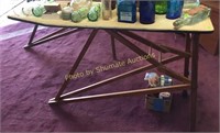 Cloth covered wooden ironing board