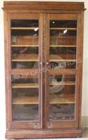 LATE 19TH C. TALL OAK 2 DOOR BOOKCASE WITH RAISED