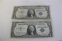 Two silver certificate dollar bills