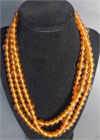 Long Strand Amber Bead Necklace