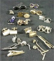 Assorted cufflinks and tie clips