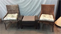 Two Wicker Chairs With Cushions And Foot Stool.