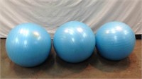 Three Light Blue Fitness Exercise Balls
