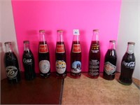 8 Collectible Coca Cola Bottles