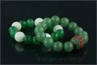 Pair of Chinese Green Jade Bracelets