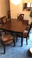 Dining room table with five chairs