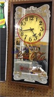 Coca-Cola clock 13 inches wide  X 25 inches tall