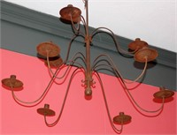A LATE 2OTH CENTURY IRON CANDLE CHANDELIER