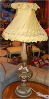 A VINTAGE TABLE LAMP WITH FIGURAL CHERUBS