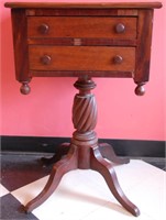 AN ANTIQUE TWO DRAWER SEWING STAND