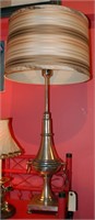 A MID 20TH C. SILVERED METAL TABLE LAMP BY STIFFEL