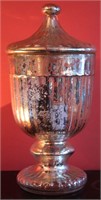 A LARGE SILVERED GLASS COVERED VASE
