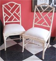 A PAIR PAINTED AND DISTRESSED FAUX BAMBOO CHAIRS