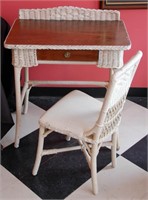 AN ANTIQUE WICKER DESK AND CHAIR