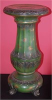 AN EARLY 20TH CENTURY POTTERY STAND