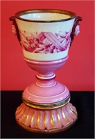 AN ANTIQUE PORCELAIN CHALICE ON STAND