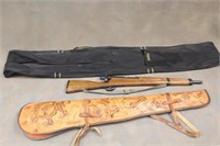 TOOLED LEATHER SCABBARD WITH TOY RIFLE