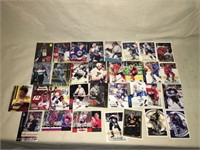 25 collectible Hockey players cards etc