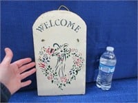 "welcome" slate sign