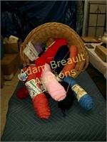 Large wicker basket and assorted yarn