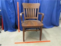 sturdy antique oak armchair