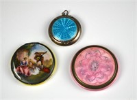 THREE SILVER AND ENAMEL COMPACTS