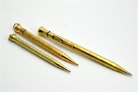 THREE GOLD AND GOLD-FILLED PENCILS