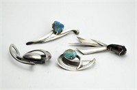 FOUR EDNA JUTTON SILVER BROOCHES