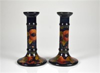 PAIR OF MOORCROFT POTTERY CANDLE STICKS