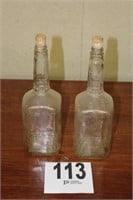 2-early liquor bottles