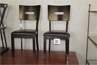 Pair of leather and wood chairs