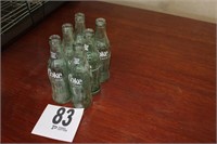6-vintage Coke bottles