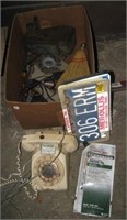 Volt tester, phone, MI license plates, hand