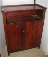 Wood bar style cabinet with two doors. Measures