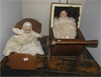 (2) Vintage ceramic baby dolls with wood cradle
