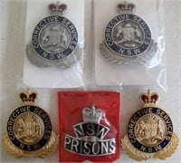 Five NSW Prison cap badges with