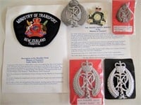 New Zealand four police cap badges with