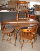 Dining table with (4) Chairs and (2) Leaves.