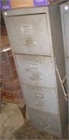 Four drawer metal filing cabinet Measures 52" h x