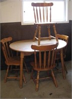 Dining table with three chairs. Measures 29" h x
