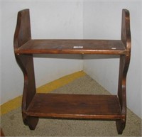 Two tier wood wall shelf. Measures 24.5" tall.