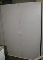 Two door white cabinet with four shelves with
