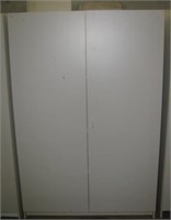 Two door white cabinet with four shelves.
