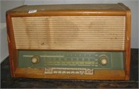 Vintage Olympic Opta radio. Measures 15" h x 23"