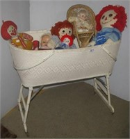Vintage bassinette with various stuffed animal