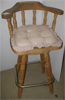 Swivel bar stool type wood chair. Seat height is