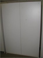 Two door white cabinet with four shelves with